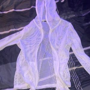 Catalina, size small, (color-white, jacket with holes that are intended.